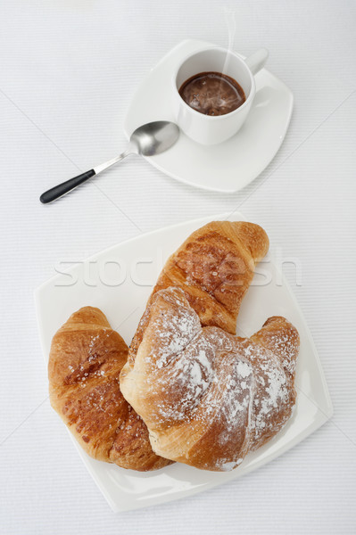 Desayuno frescos panadería croissants taza café Foto stock © limpido