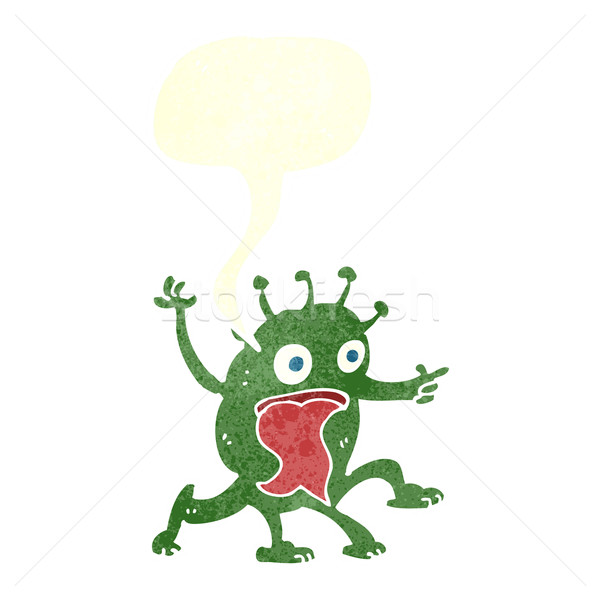 Stock photo: cartoon weird little alien with speech bubble