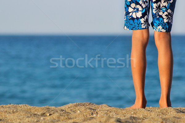 Ragazzi gambe spiaggia ragazzo piedi guardando Foto d'archivio © Lio22