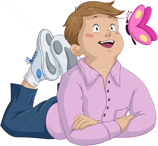 Innocent Brunette Boy Laying And Looking At Butterfly Stock photo © LironPeer