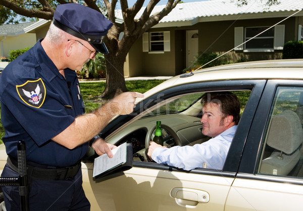 Policía enojado oficial de policía borracho conductor Foto stock © lisafx