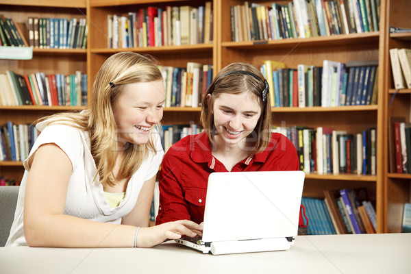 Biblioteca ricerca teen ragazze netbook stanza Foto d'archivio © lisafx