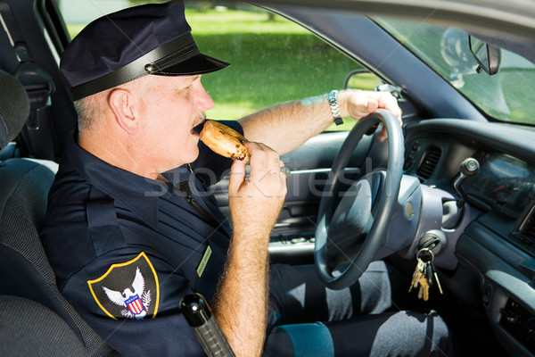 Police Snacking on the Job Stock photo © lisafx