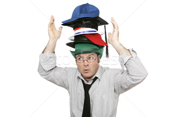 überwältigt Geschäftsmann Verantwortung tragen viele Hüte Stock foto © lisafx