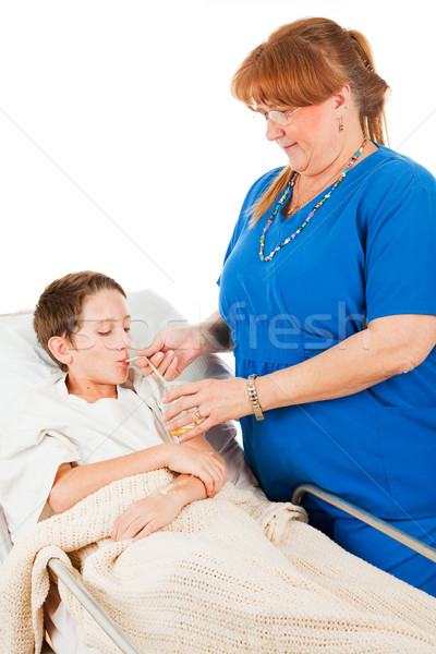 Nurse Administers Fluids Stock photo © lisafx