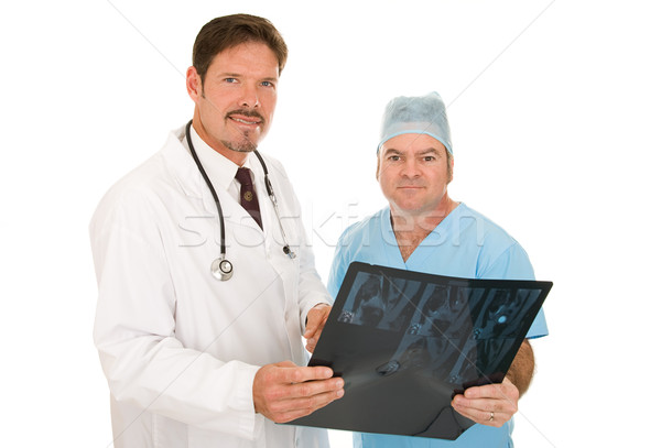 Vertrauenswürdig Ärzte gut aussehend Arzt Chirurg Beratung Stock foto © lisafx