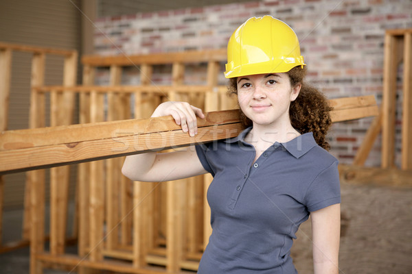 Feminino construção aprendiz jovem trabalhando Foto stock © lisafx