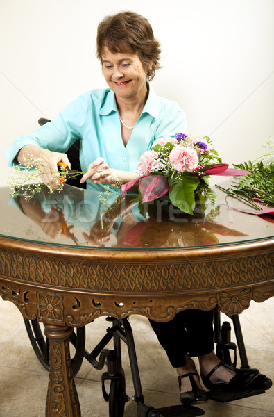 Disabled Florist Trims Babys Breath Stock photo © lisafx