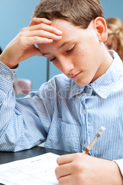School Boy Concentrates on Standardized Test Stock photo © lisafx