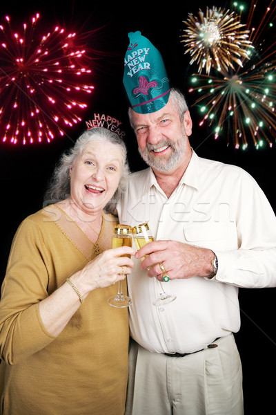 Nouvelle ans fête feux d'artifice couple de personnes âgées bit [[stock_photo]] © lisafx