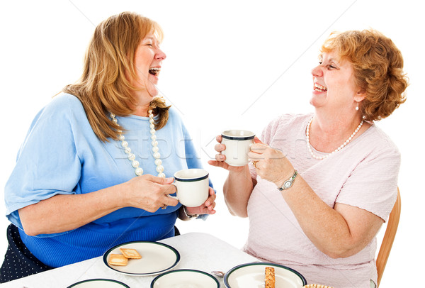 Friends Laughing Over Tea Stock photo © lisafx