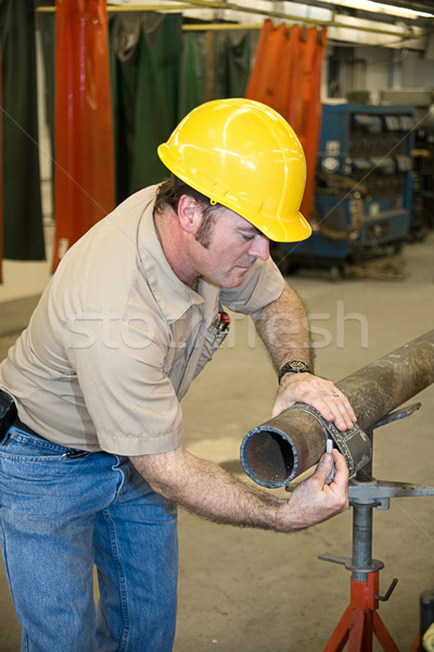 Metal Worker Measures Pipe Stock photo © lisafx