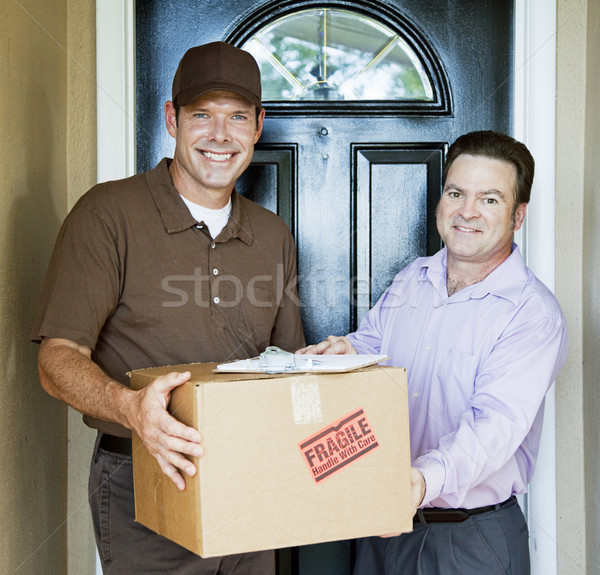 Házhozszállítás futár kezek csomag elégedett vásárló Stock fotó © lisafx