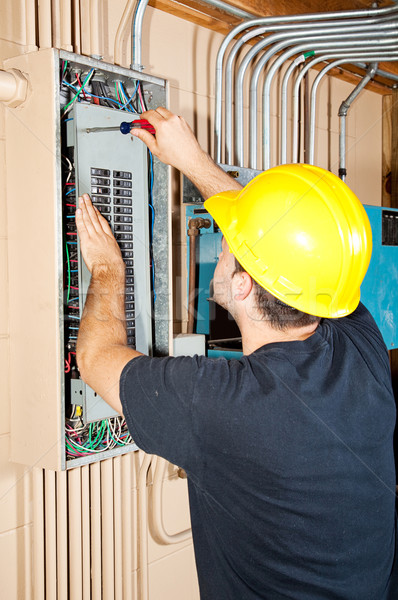 Ipari elektromos munka villanyszerelő dolgozik panel Stock fotó © lisafx