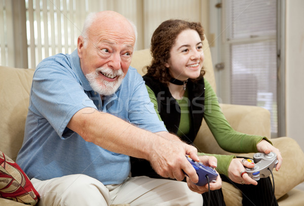 Senior Mann spielen Videospiele Videospiel jugendlich Stock foto © lisafx