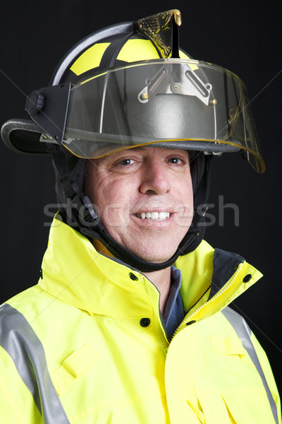 Strażak portret czarny przyjazny uśmiechnięty ognia Zdjęcia stock © lisafx