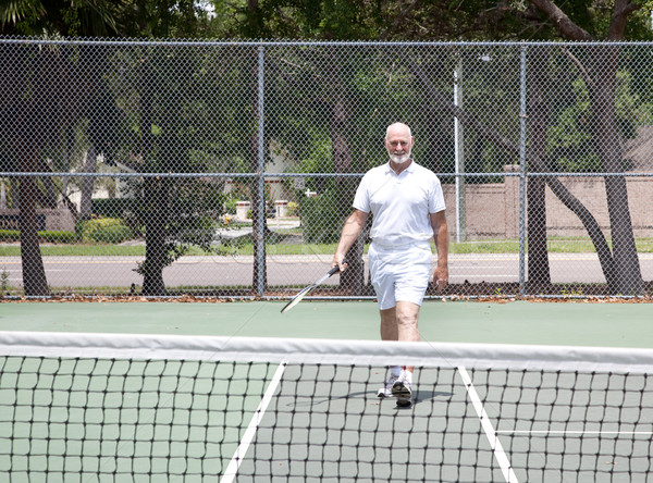 Senior Man on Tennis Court Stock photo © lisafx