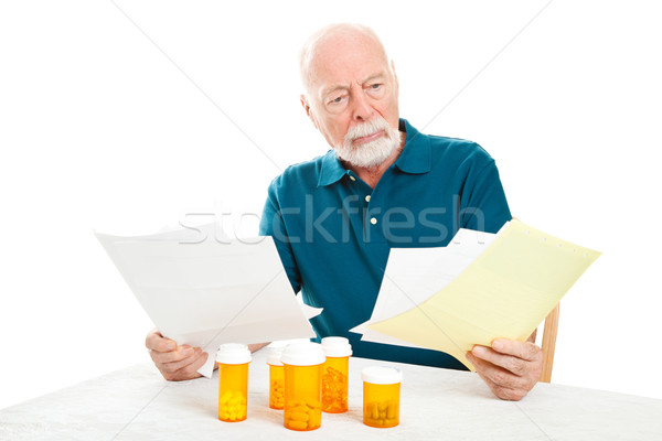  Depressed Senior Man - Medical Bills Stock photo © lisafx