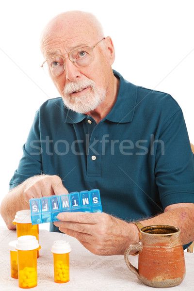 Senior man geneeskunde verward niet Stockfoto © lisafx