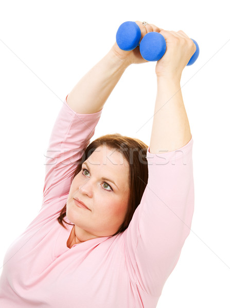 Plus Size Woman Using Hand Weights Stock photo © lisafx