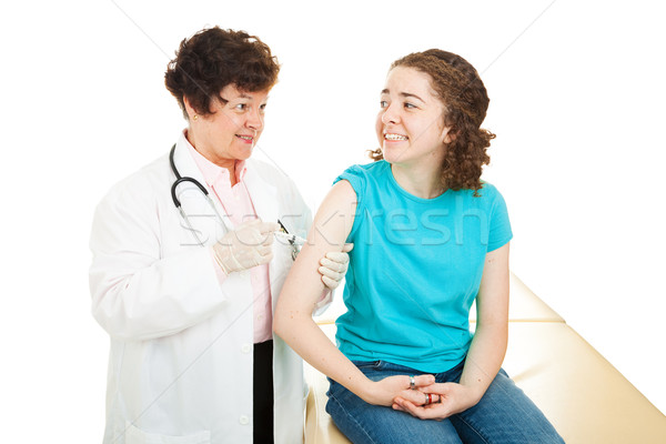 Adolescente nervoso vacinação feminino médico Foto stock © lisafx