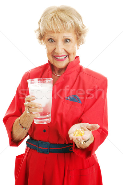 Omega 3 untura de peste sănătate sănătos senior femeie Imagine de stoc © lisafx