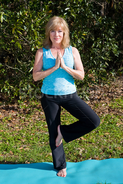 Stock photo: Mature Woman Yoga - Tree Pose