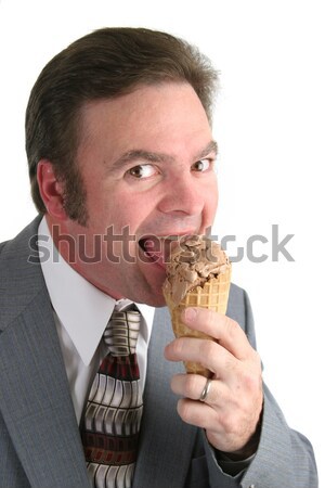 üzletember élvezi fagylalttölcsér jóképű kaukázusi eszik Stock fotó © lisafx
