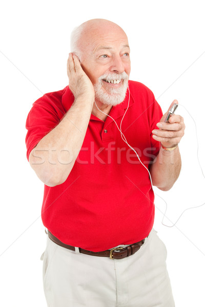 Senior Man Playing MP3s Stock photo © lisafx