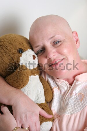 Stock photo: Cancer Patient Comforted by Teddy Bear