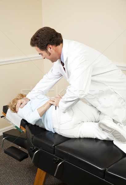 Wirbelsäule Einstellung Chiropraktiker Patienten Frau medizinischen Stock foto © lisafx
