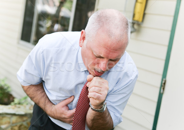 Volwassen man hoesten volwassen zakenman grijs haar slechte Stockfoto © lisafx