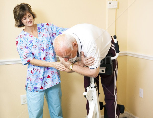 Physical Therapist Helping Patient Stock photo © lisafx