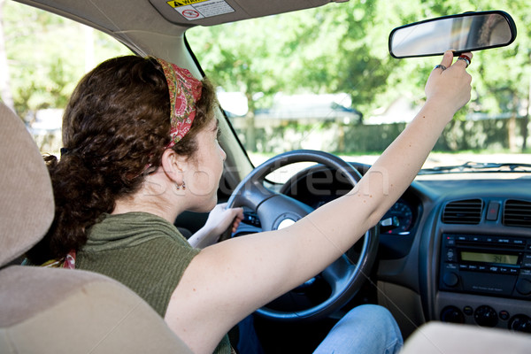 Teen driver specchio auto felice interni Foto d'archivio © lisafx