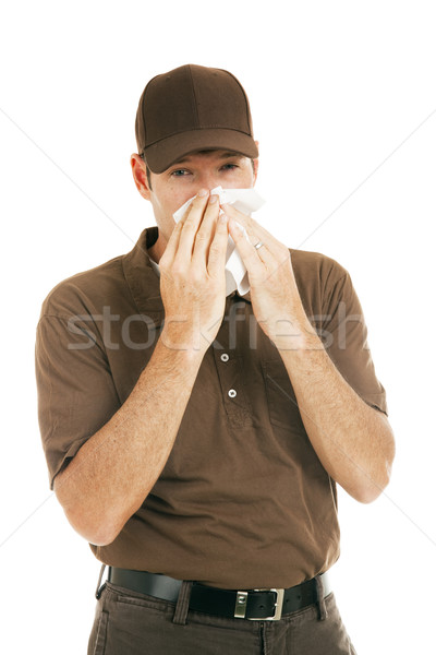 Munkás influenza orrot fúj izolált fehér állás Stock fotó © lisafx