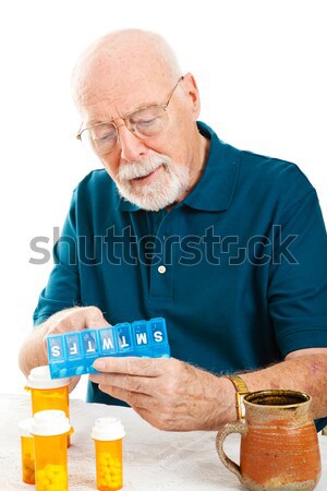 Bezorgd hoog bloeddruk senior man home Stockfoto © lisafx