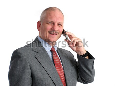 Happy Businessman On Cell Phone Stock photo © lisafx