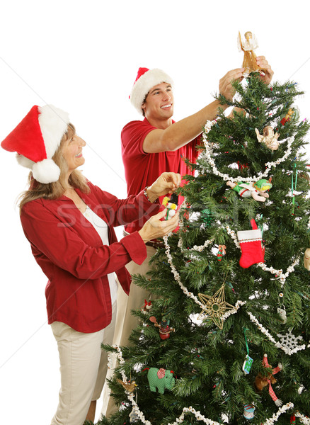 Son Helps Mom Decorate Christmas Tree Stock photo © lisafx