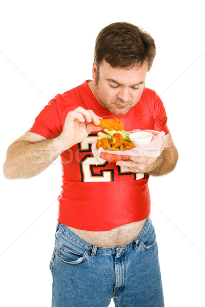 Zsíros tyúk szárnyak túlsúlyos középkorú férfi eszik Stock fotó © lisafx
