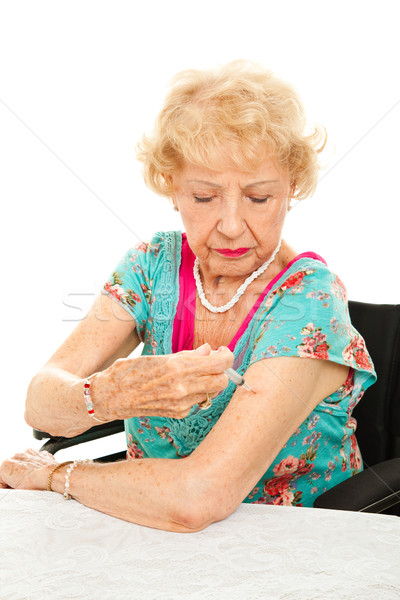 Senior Woman Gives Self Injection Stock photo © lisafx