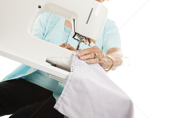 Stock photo: Senior Sewing Hands