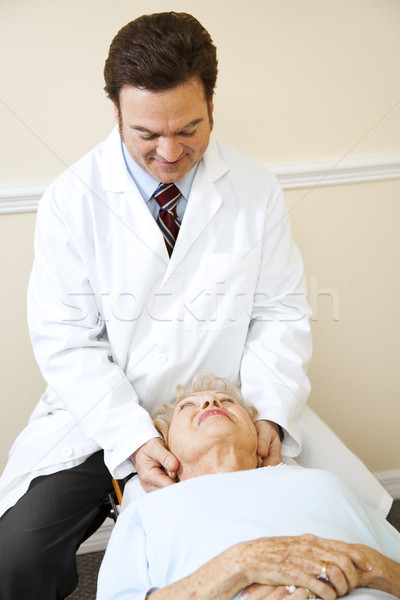 Csontkovács nyaki fájdalom barátságos idős gerincoszlop nyak Stock fotó © lisafx