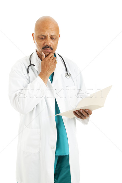 Doctor Reviews Patient Chart Stock photo © lisafx