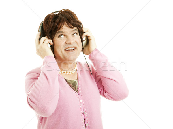 Kobiet słuchawki krzyż ubieranie się sławna słuchania Zdjęcia stock © lisafx