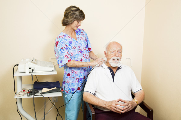 Ultrasound Therapy for Senior Man Stock photo © lisafx