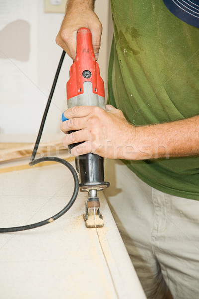 Reciprocating Saw on Laminate Stock photo © lisafx