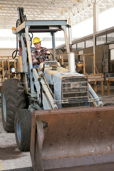 Worker Driving Backhoe Stock photo © lisafx