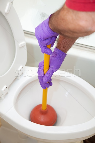 Toilettes plombiers mains accent vers l'avant Photo stock © lisafx