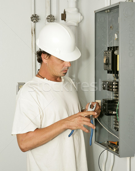 Stock photo: Electrician Trimming Wire