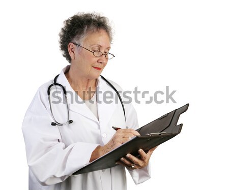 Mature Female Doctor Taking Notes Stock photo © lisafx